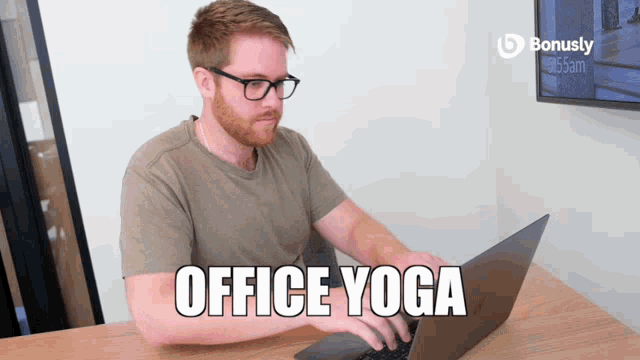 Bonusly Office Yoga GIF - Bonusly Office Yoga Laptop GIFs