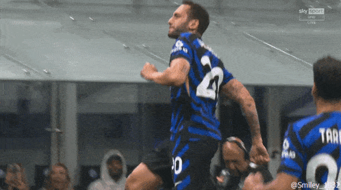 a soccer player wearing a jersey with the number 21 on it