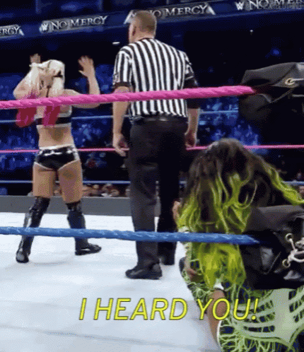 a woman in a wrestling ring with the words i heard you
