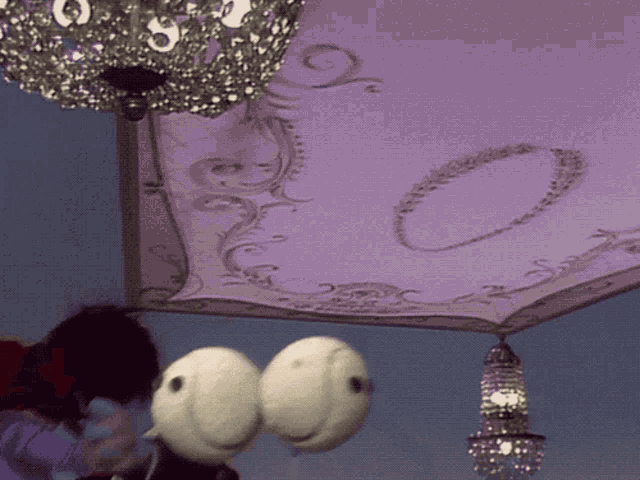 a purple umbrella with a floral design on it