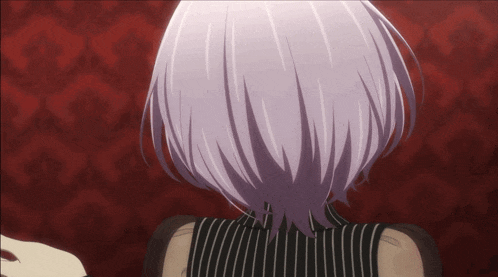 a woman with purple hair and a black and white striped shirt