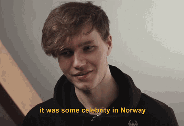 a man in a black hoodie is talking about celebrity in norway