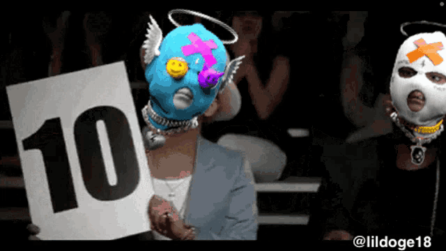 a man in a mask holds up a sign with the number 10