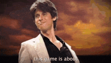 a man in a suit and black shirt is smiling and says this game is about .