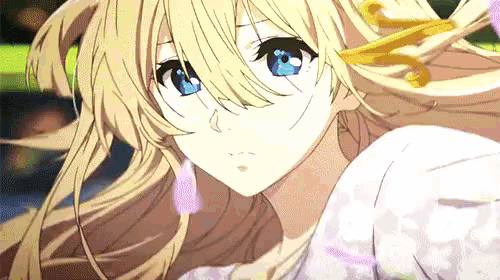 a blonde anime girl with blue eyes is looking at the camera .