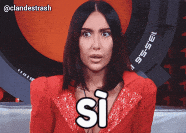a woman in a red jacket says si in a bubble