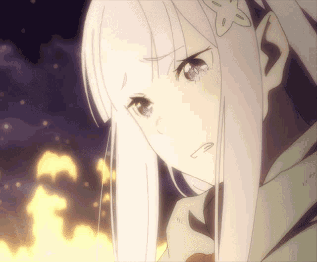 a close up of a girl with white hair and a star on her head