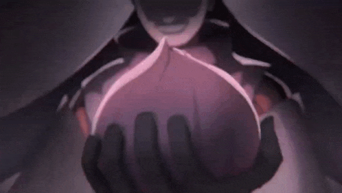 a woman is holding a purple object in her hands .