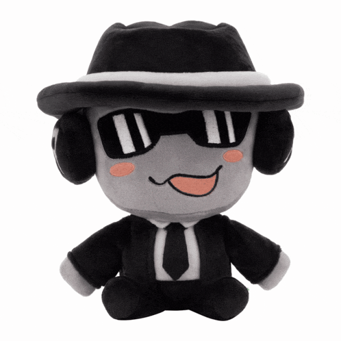 a stuffed toy wearing a hat and sunglasses is sitting on a white background