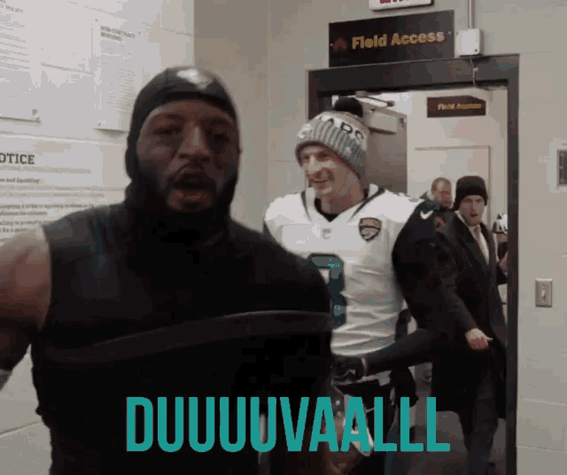 a man wearing a mask and a jaguars jersey says duuuuvaall