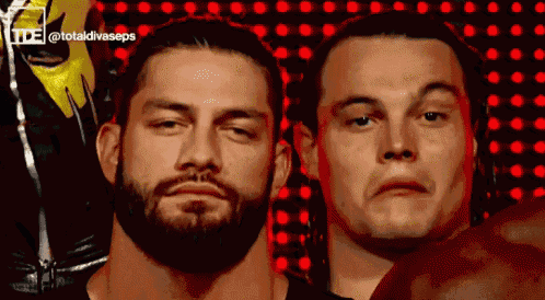 two men are standing next to each other and one of them is wearing a mask that says totaldivaseps