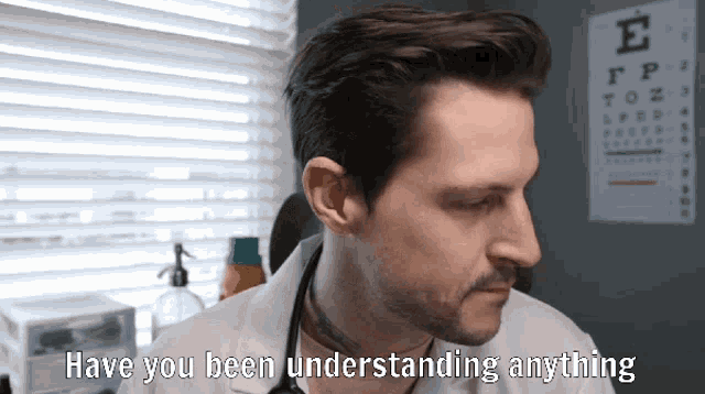a doctor says have you been understanding anything in front of an eye chart