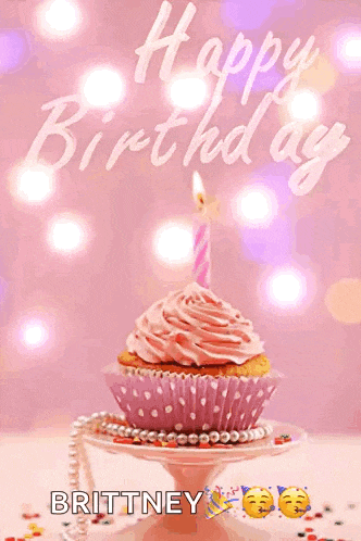 a cupcake with pink frosting and a candle is on a cake stand with the words happy birthday brittney on the bottom