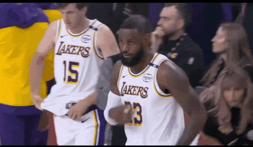 a basketball player wearing a lakers jersey number 23
