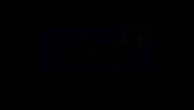 a vtm logo that is orange and white on a black background