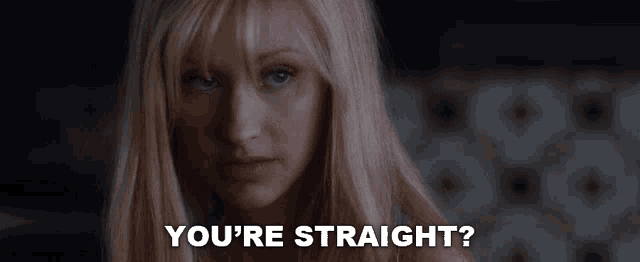 a close up of a woman with the words " you 're straight " above her