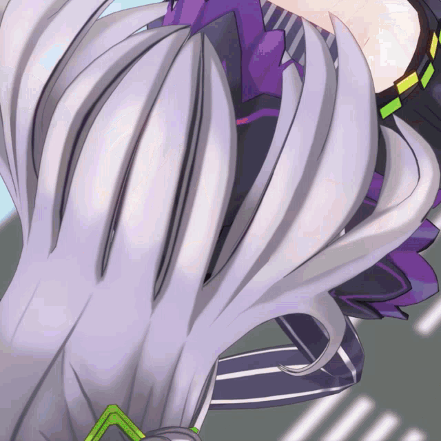 a close up of a person 's hair with a purple and green stripe