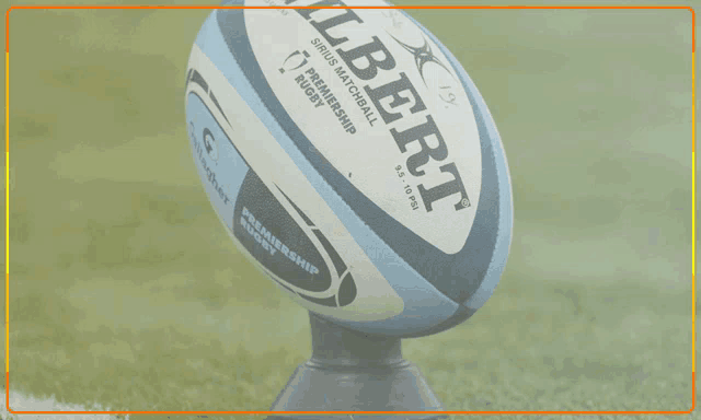 an ad for rugby scoreboards shows a rugby ball