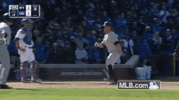a baseball game is being played and mlb.com is displayed