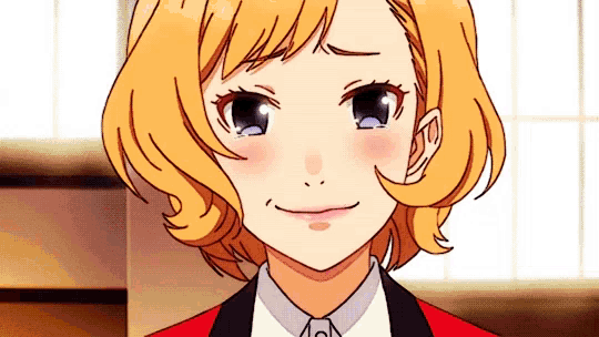 a close up of a girl 's face with blonde hair