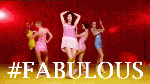 a group of women are dancing in front of a sign that says # fabulous .
