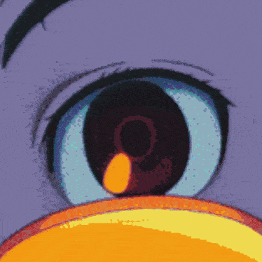 a close up of a cartoon character 's eye with a yellow spot in it