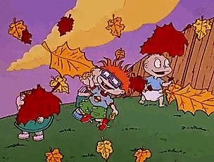 a cartoon of rugrats playing with leaves in the fall
