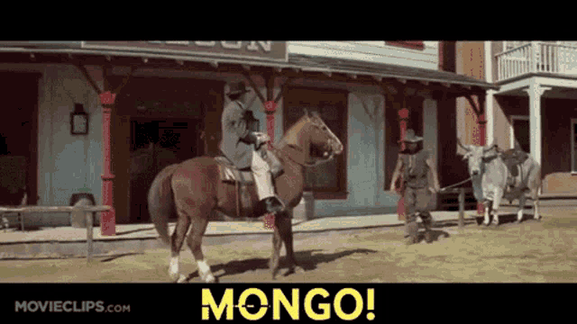 a man riding a horse in front of a building with mongo written on the bottom
