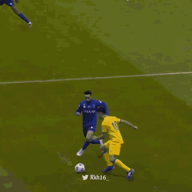 a soccer player with the number 10 on his jersey is kicking the ball