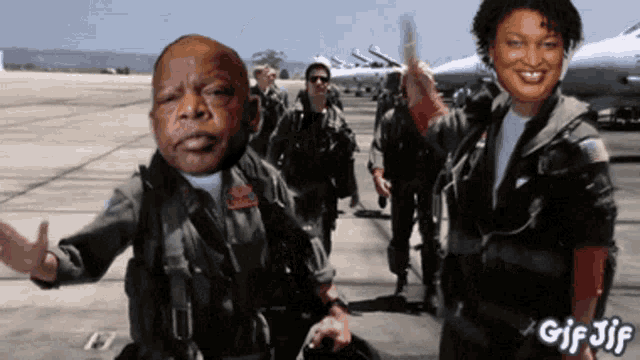a gif of a man and a woman with the words gif jif in the bottom right corner