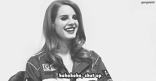Lana Del Rey Doesn'T Find It Funny GIF - Lana Del Rey Laugh Smile GIFs