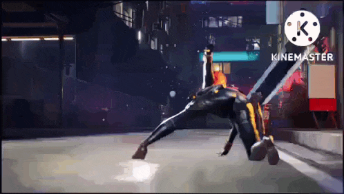 a person in a superhero costume is doing a trick on the ground .