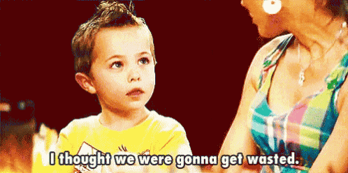 a little boy is sitting next to a woman and says " i thought we were gonna get wasted "