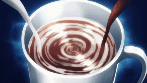 a cup of hot chocolate with a swirl in the middle