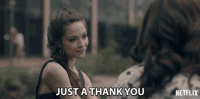 a woman says just a thank you in front of another woman