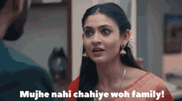 a woman talking to a man with the words mujhe nahi chahiye woh family