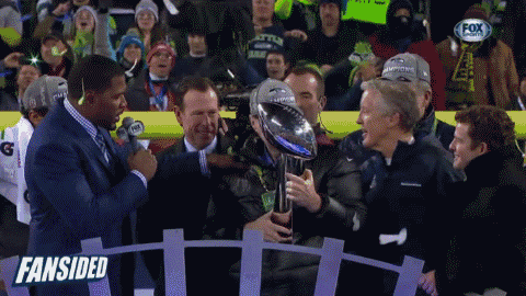 Seattle'S Happiest Moment Ever GIF - Trophy Seattle Win GIFs