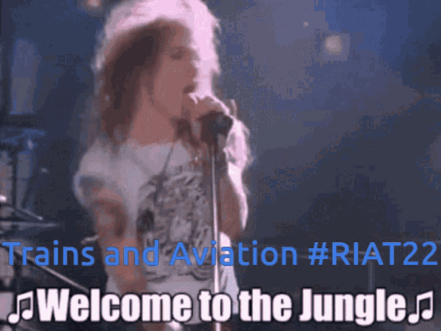a woman singing into a microphone with the words welcome to the jungle written below her
