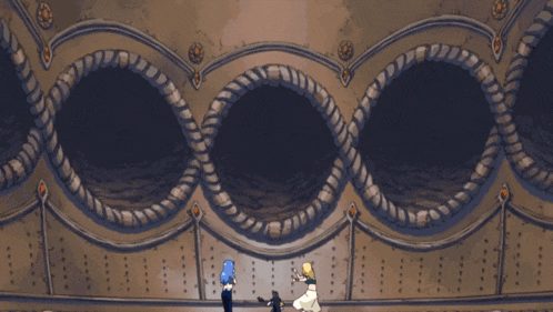 a group of people are standing in front of a building with water coming out of it