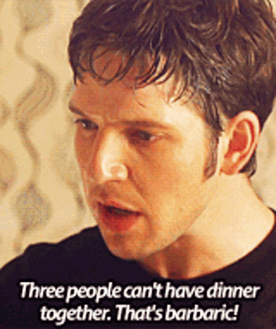 a man is talking about three people can 't have dinner together