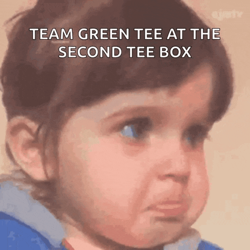 a little girl with a sad look on her face with the words team green tee at the second tee box