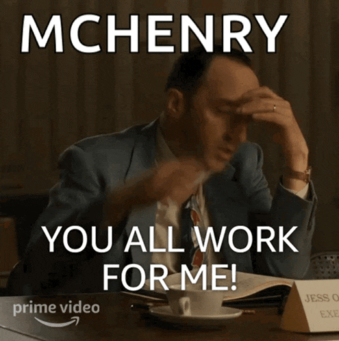 a man in a suit and tie says mchenry you all work for me on a poster