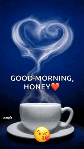 a cup of coffee with a heart shaped smoke coming out of it