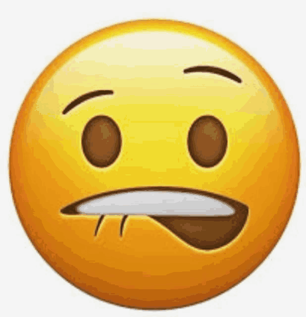 a close up of a smiley face with a tongue sticking out on a white background .