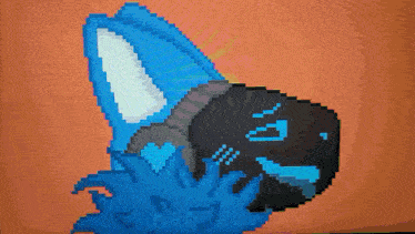 a pixel art drawing of a blue and black animal with the name kapziu on the bottom right