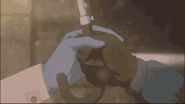 a person is holding an umbrella with their hand