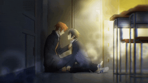 a couple of anime characters sitting on the floor