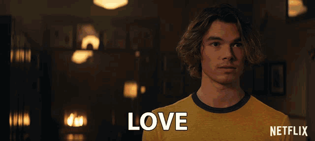 a man in a yellow shirt with the words for life written on it