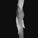 it is a black and white photo of two hands reaching out towards each other .