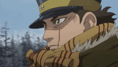 a man with a scarf around his neck and a hat on